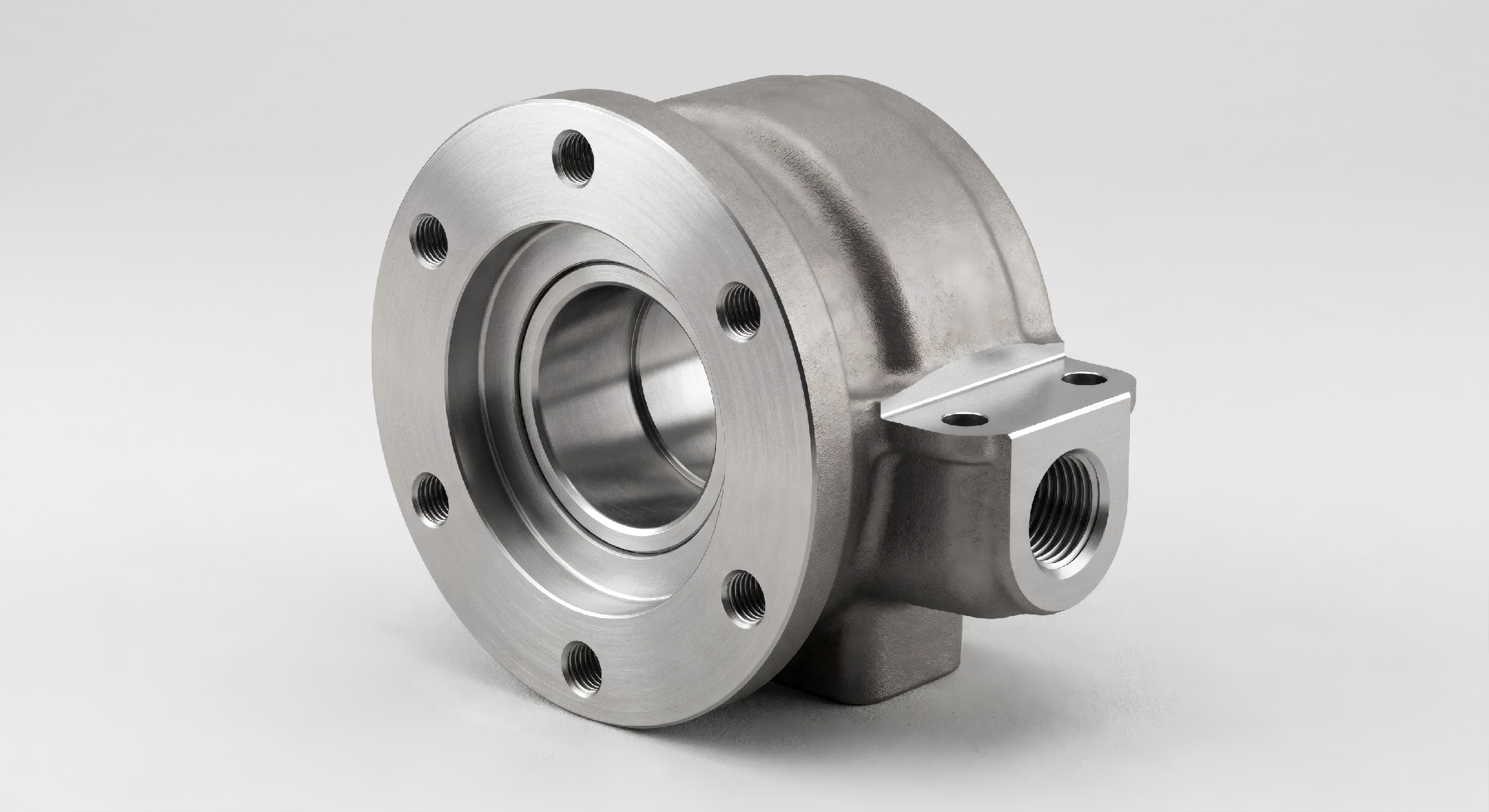 Machined Functional Areas on Investment Castings Investment cast steel component with machined bores sealing faces and mounting areas