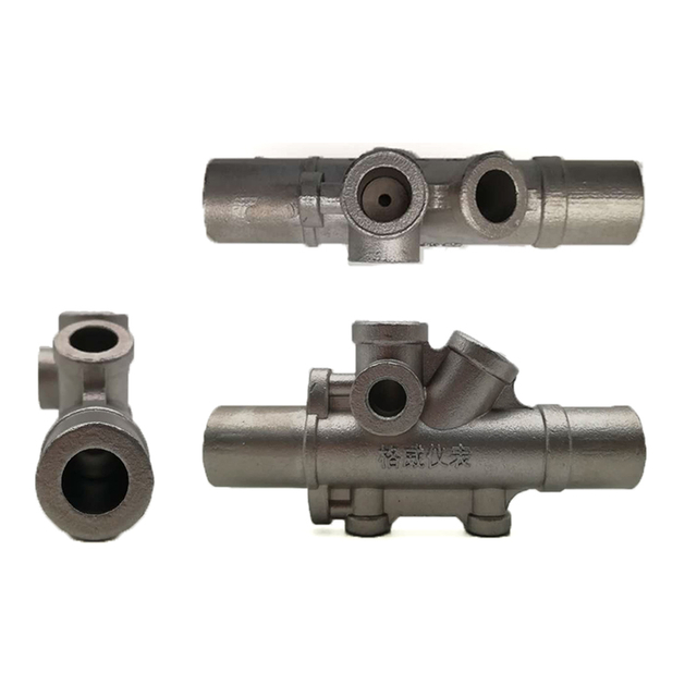Investment cast multi-port housing shown from three different angles