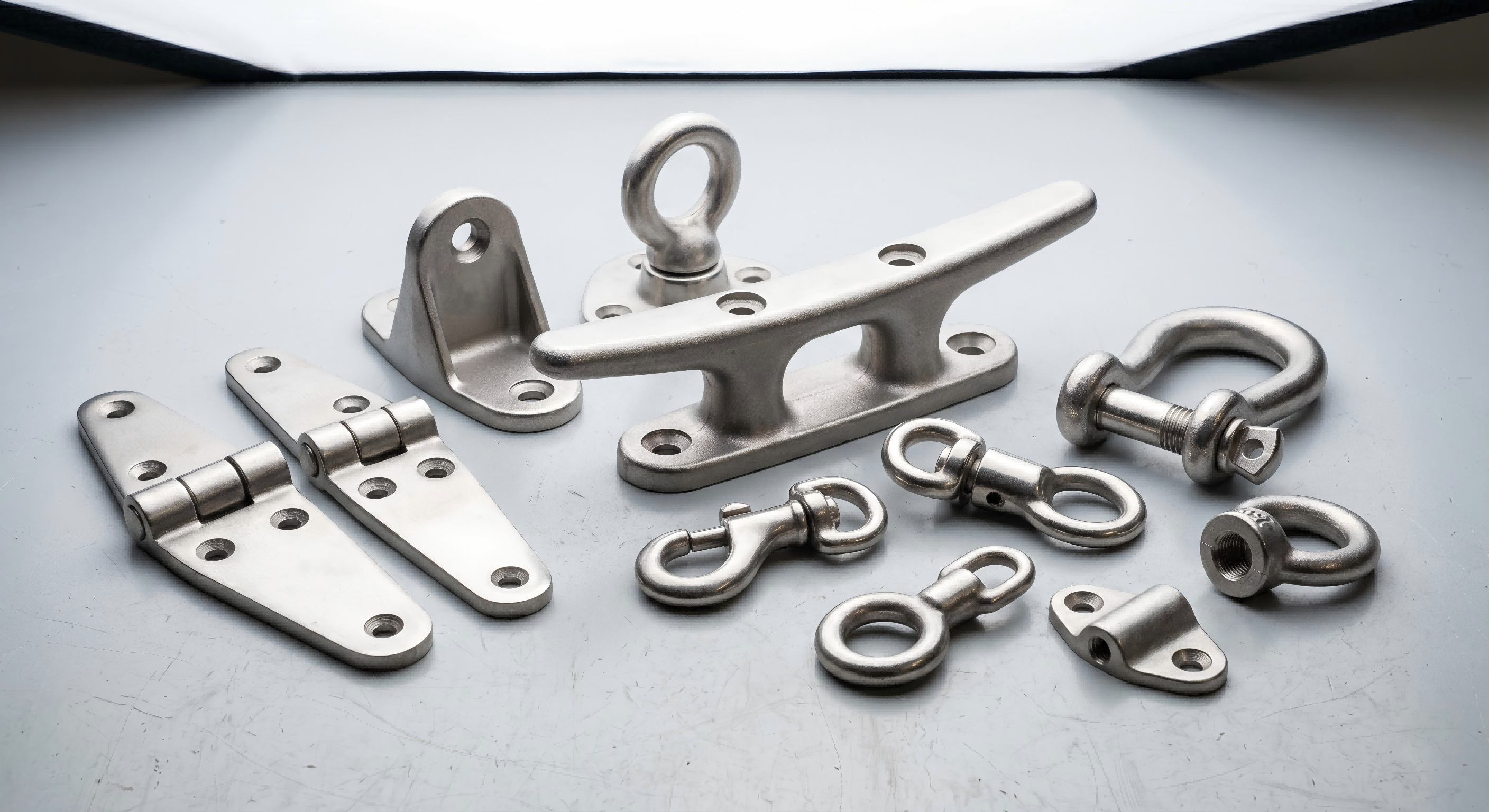 Stainless steel marine hardware casting with corrosion resistant finish