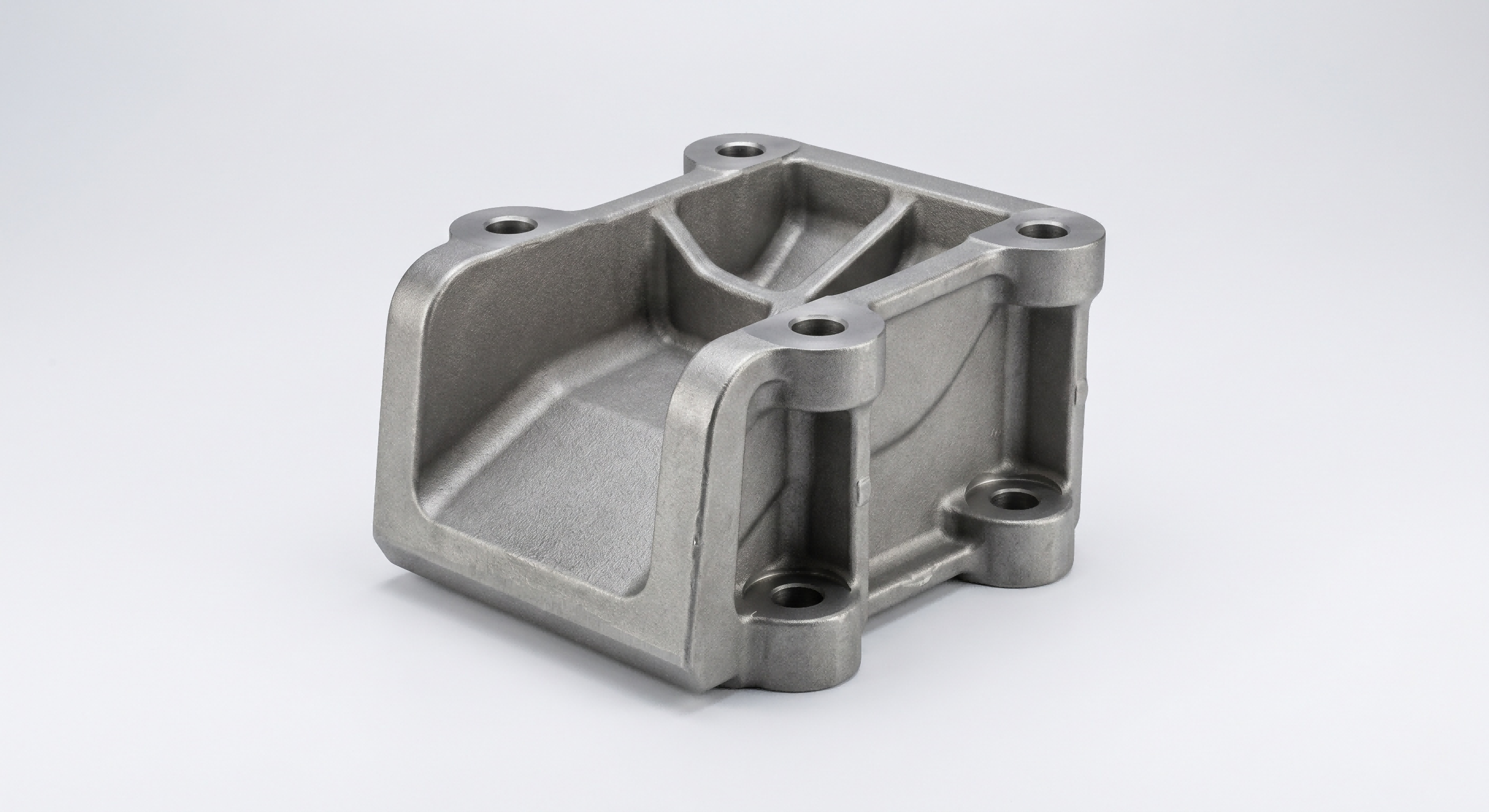 Wear-resistant steel investment casting component for industrial machinery applications